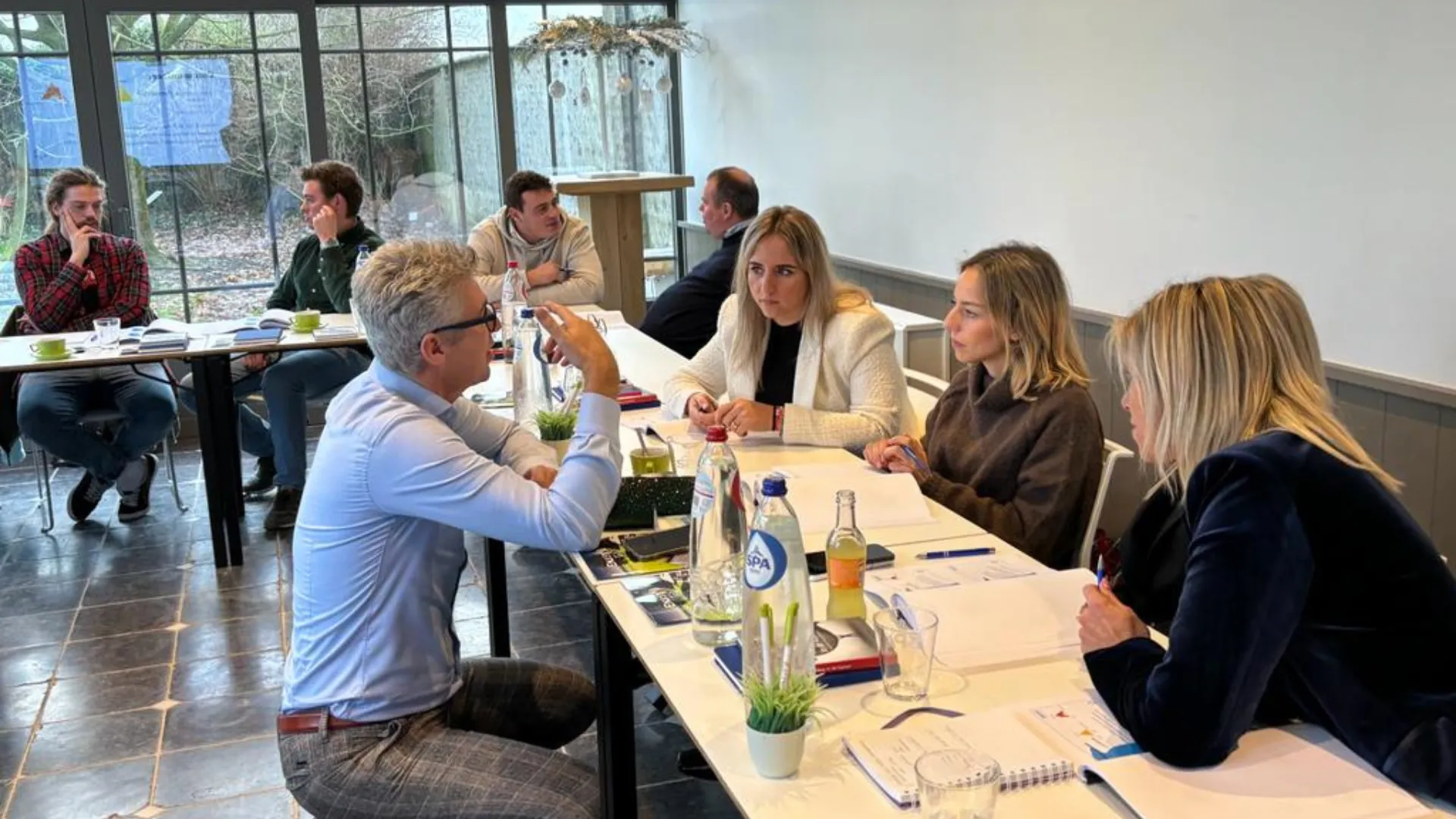 A working session at a long table